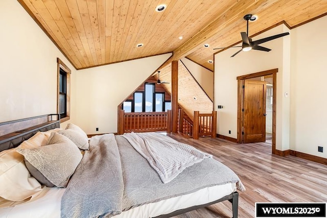 bedroom with crown molding, wood ceiling, lofted ceiling with beams, and light hardwood / wood-style floors