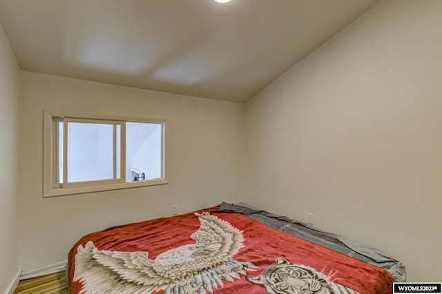 bedroom featuring hardwood / wood-style floors