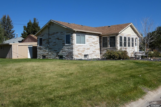 view of home's exterior featuring a lawn