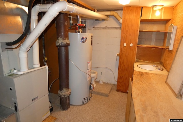 utilities featuring gas water heater and sink