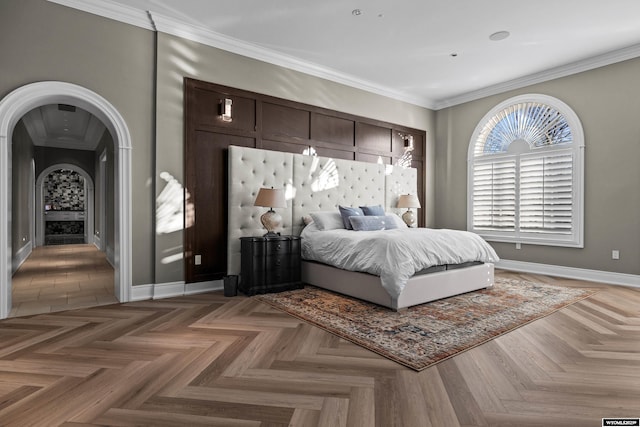 bedroom with parquet flooring and ornamental molding