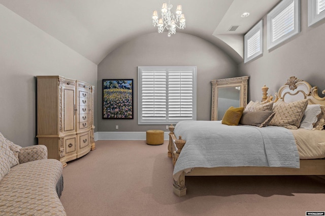 carpeted bedroom with lofted ceiling and a notable chandelier