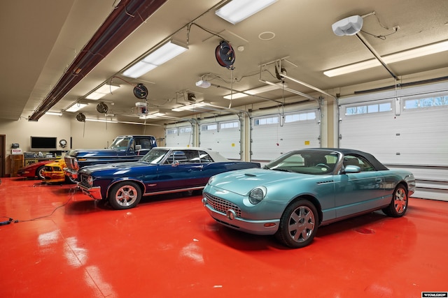 garage featuring a garage door opener