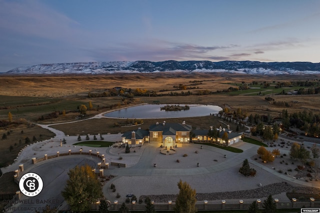 aerial view at dusk with a mountain view