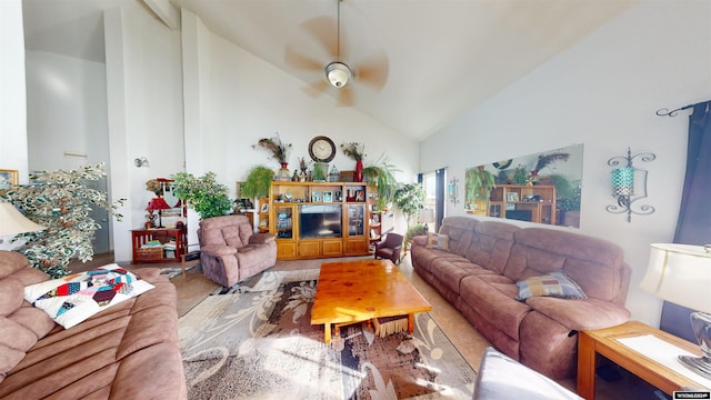 living room with ceiling fan, light hardwood / wood-style floors, and high vaulted ceiling