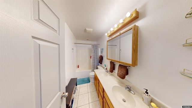 full bathroom with toilet, shower / tub combo, vanity, and tile patterned floors