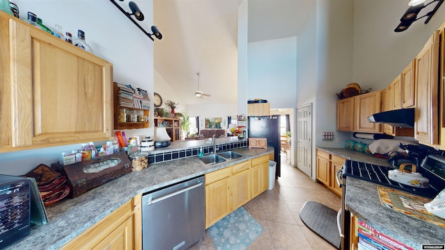 kitchen with electric range, sink, high vaulted ceiling, stainless steel dishwasher, and light tile patterned floors