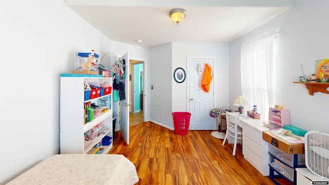 bedroom featuring light hardwood / wood-style floors