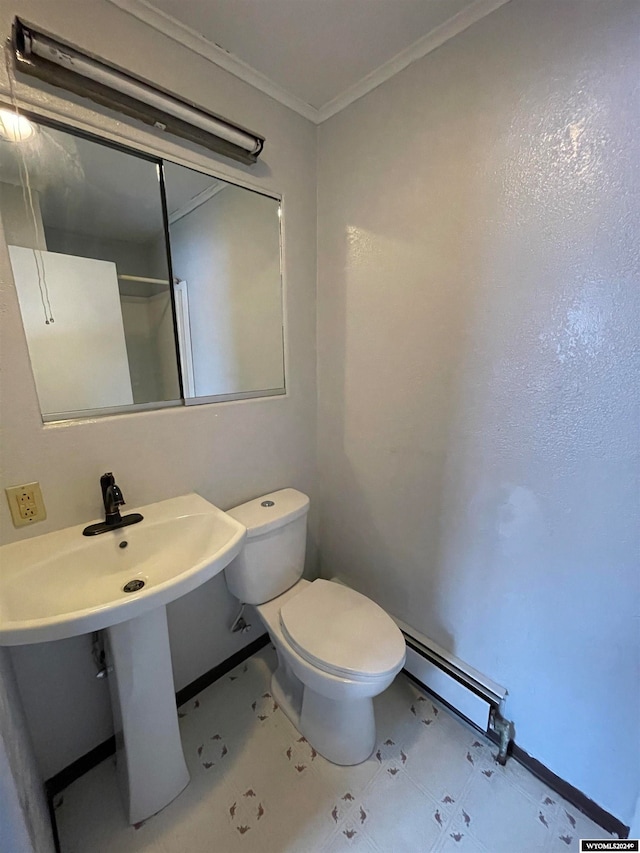 bathroom featuring tile flooring, sink, toilet, a baseboard heating unit, and ornamental molding