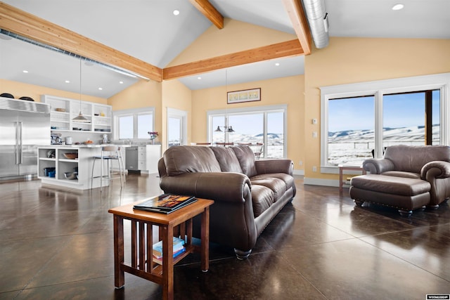 living room with high vaulted ceiling and beamed ceiling