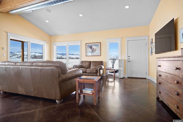 living room with vaulted ceiling with beams