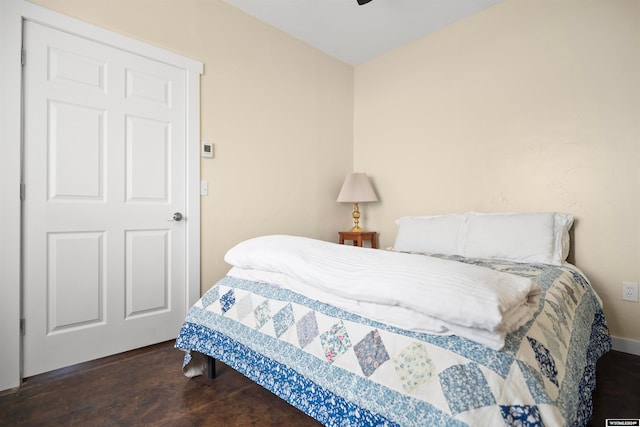 bedroom featuring dark wood-type flooring