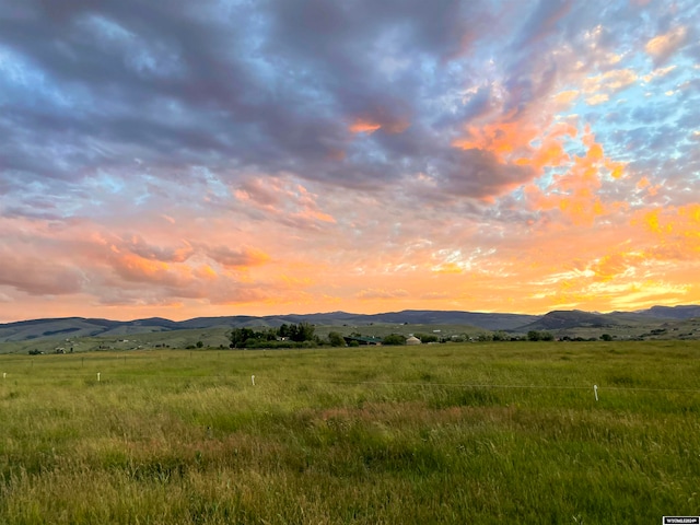 property view of mountains featuring a rural view