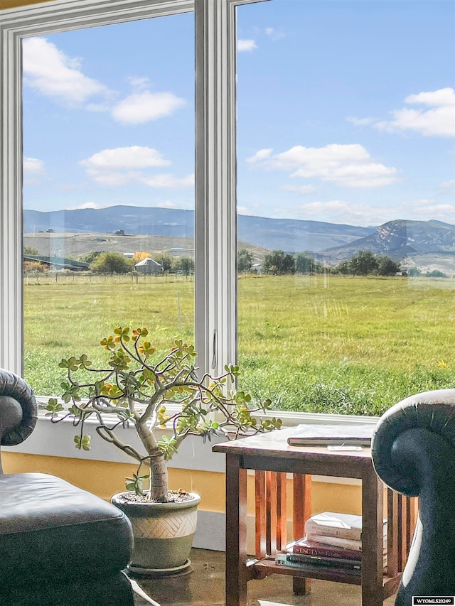 interior space featuring a mountain view and a rural view