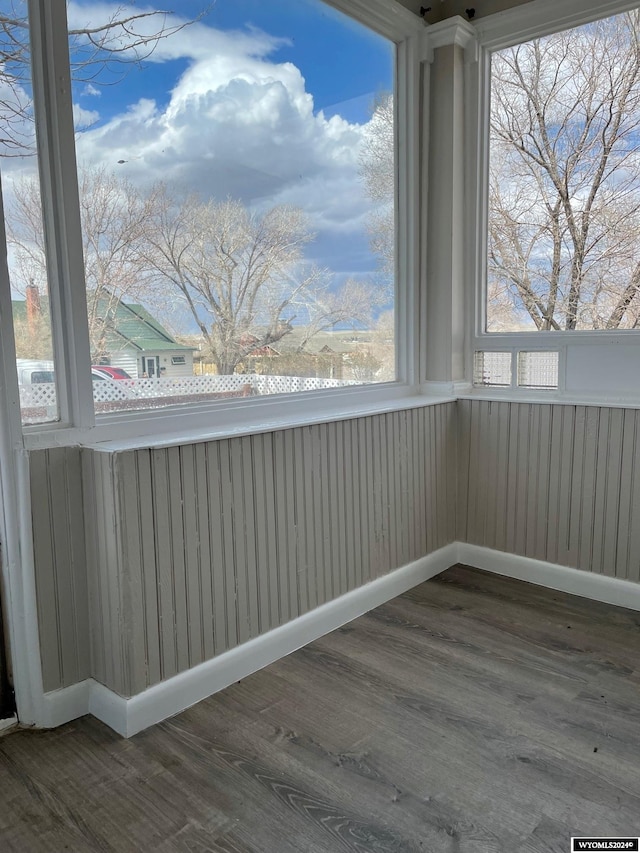 spare room featuring dark wood-type flooring