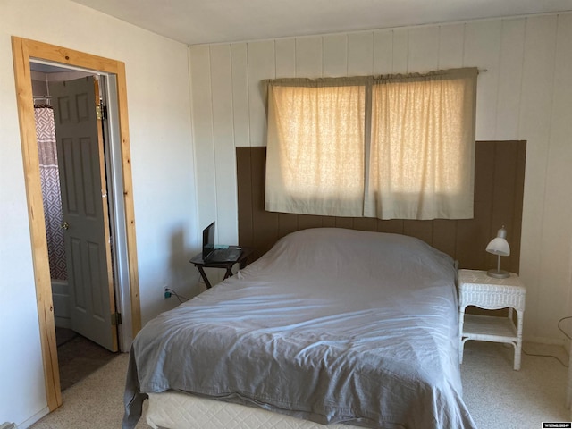 bedroom with light colored carpet