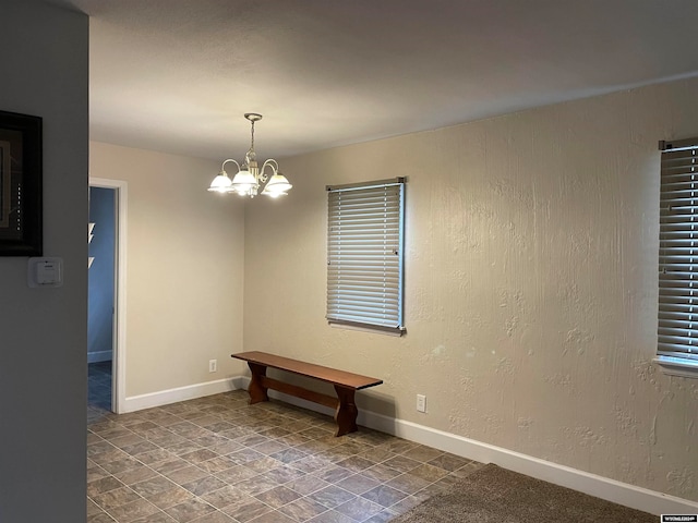 interior space with an inviting chandelier