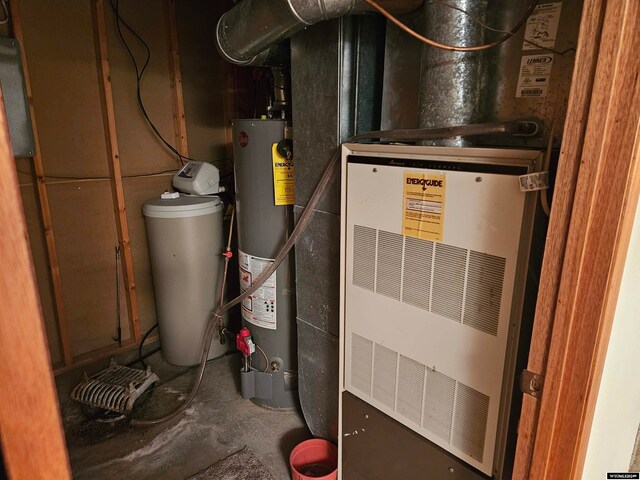 utility room with water heater