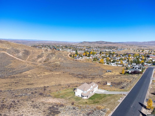 bird's eye view with a mountain view