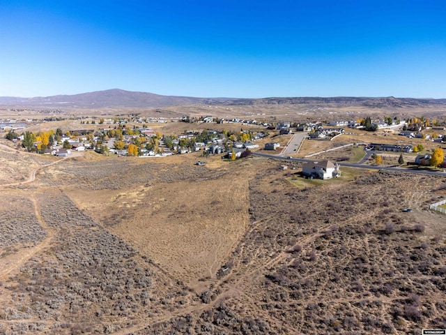 drone / aerial view featuring a mountain view