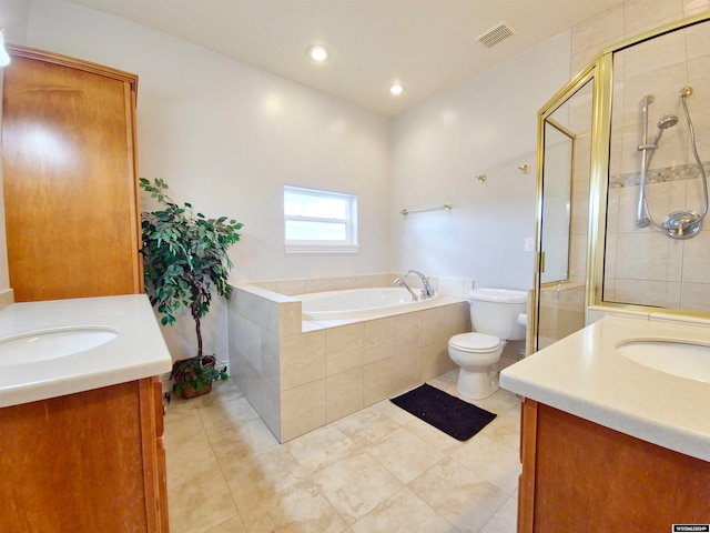 full bathroom with tile patterned floors, vanity, toilet, and shower with separate bathtub