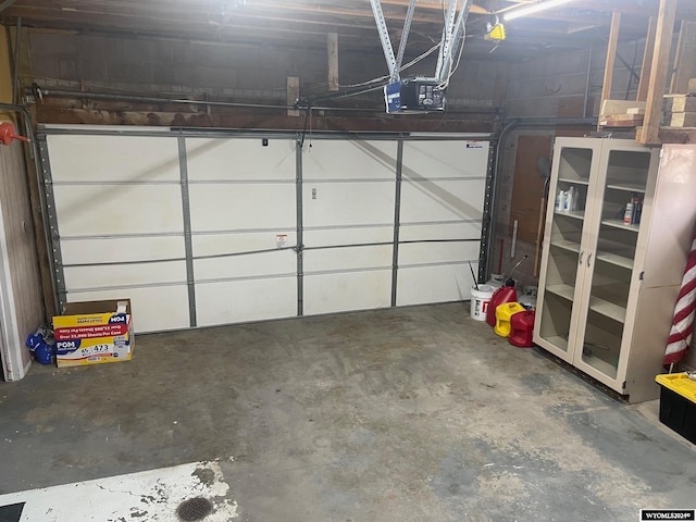 garage featuring a garage door opener