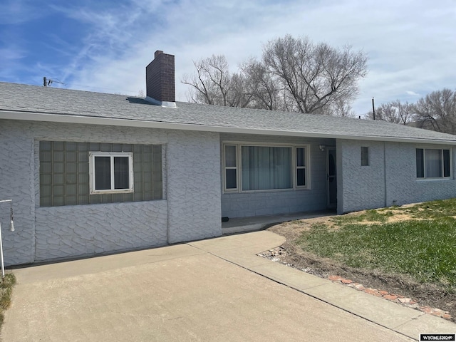 single story home with a patio