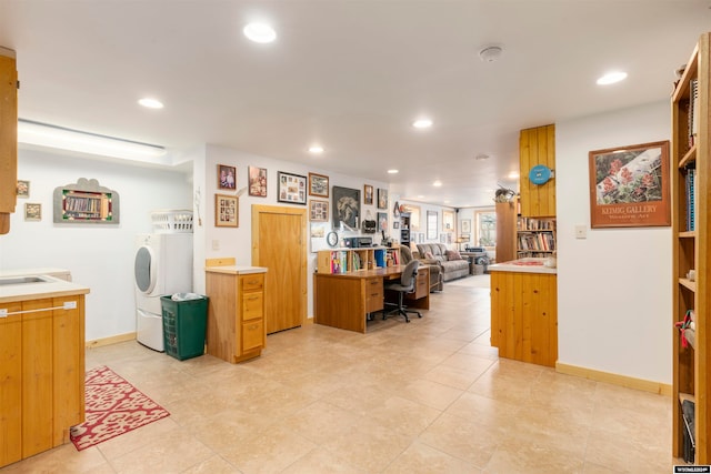 interior space with light tile flooring and washer / clothes dryer