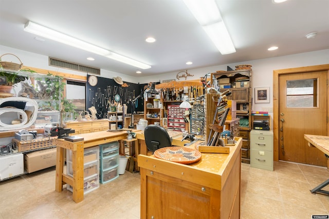 home office with light tile floors