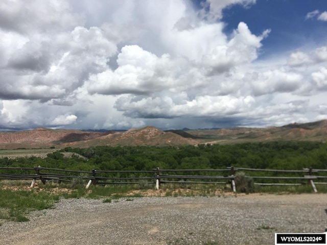 view of mountain feature with a rural view