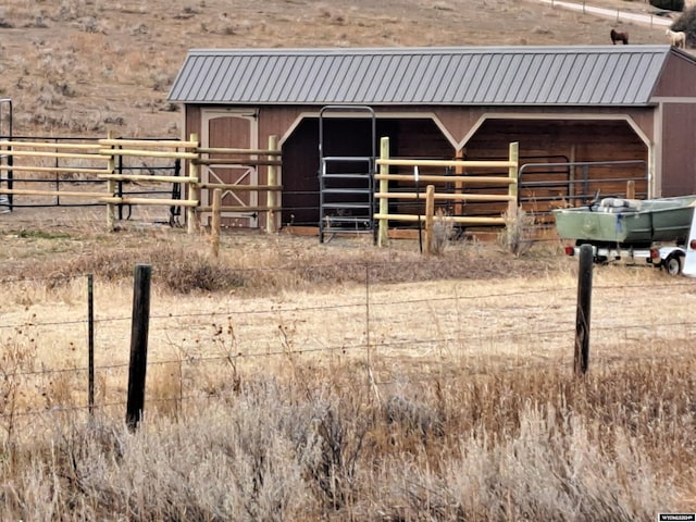 view of stable featuring an outdoor structure