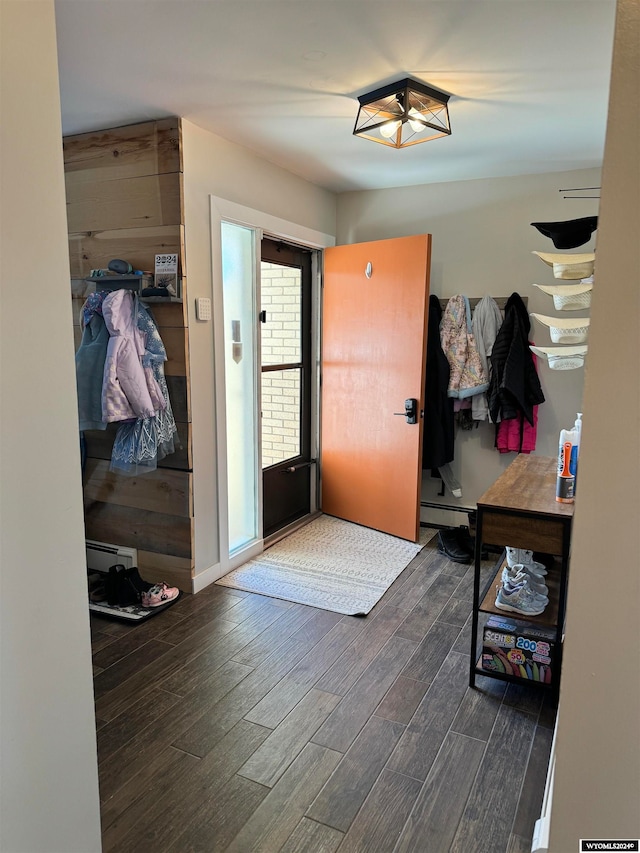 mudroom featuring dark hardwood / wood-style flooring and baseboard heating