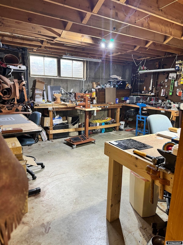 basement with a workshop area