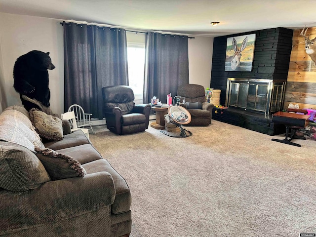 living room with carpet flooring and a large fireplace