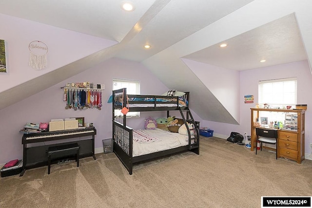 carpeted bedroom featuring vaulted ceiling