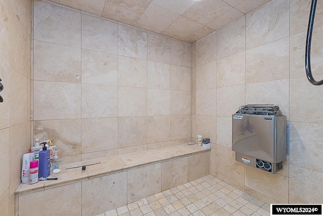 bathroom with tiled shower