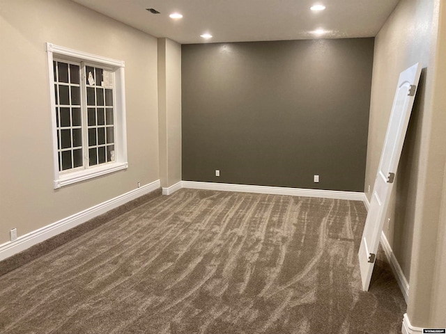 view of carpeted spare room