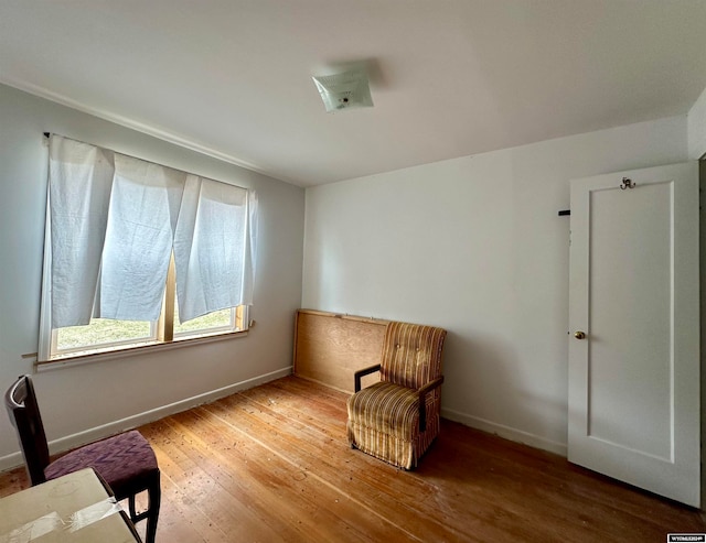 living area featuring hardwood / wood-style flooring