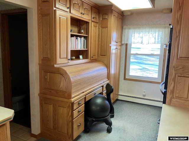 home office with a baseboard radiator