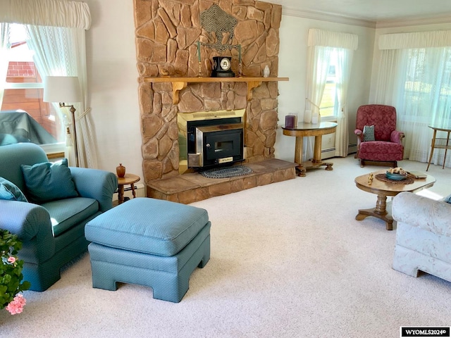 carpeted living room with ornamental molding and a fireplace