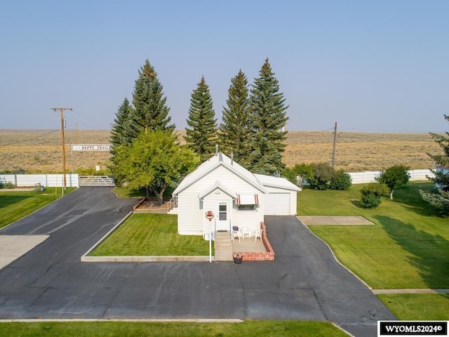 birds eye view of property featuring a rural view