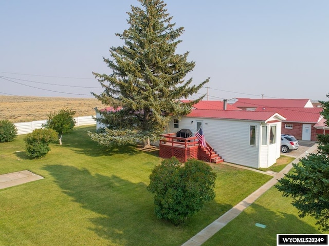 view of yard featuring a deck