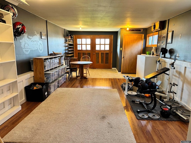 living room featuring hardwood / wood-style flooring and french doors