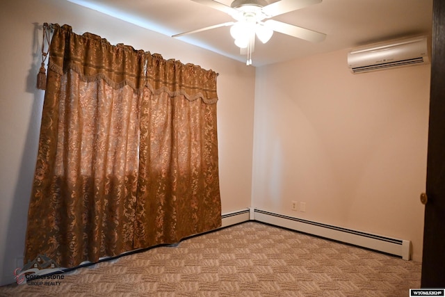 spare room featuring a wall mounted air conditioner, ceiling fan, and baseboard heating