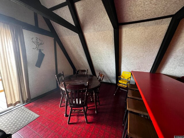 dining space featuring tile flooring