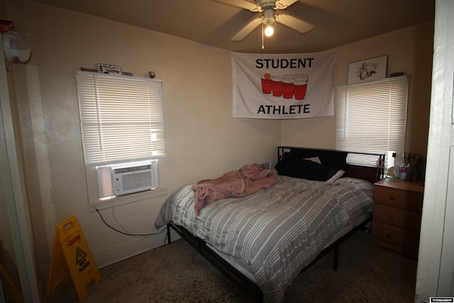 bedroom featuring ceiling fan, cooling unit, and dark colored carpet