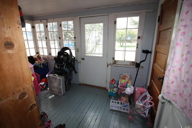 interior space featuring french doors and hardwood / wood-style flooring