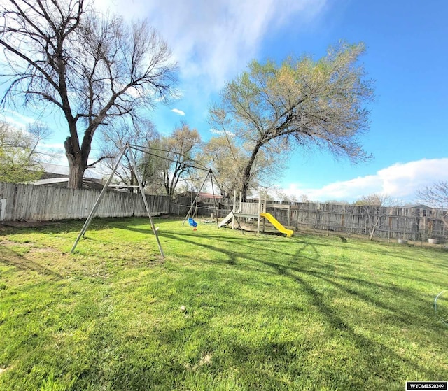 view of yard with a playground