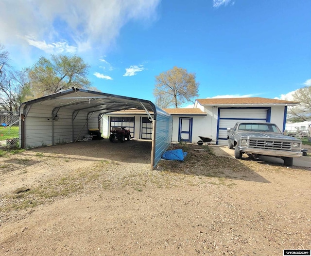 exterior space with a carport