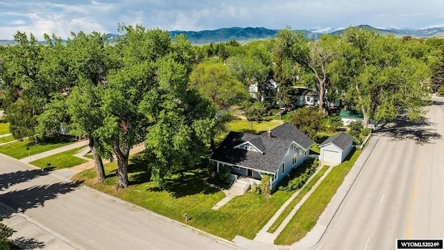 birds eye view of property with a mountain view